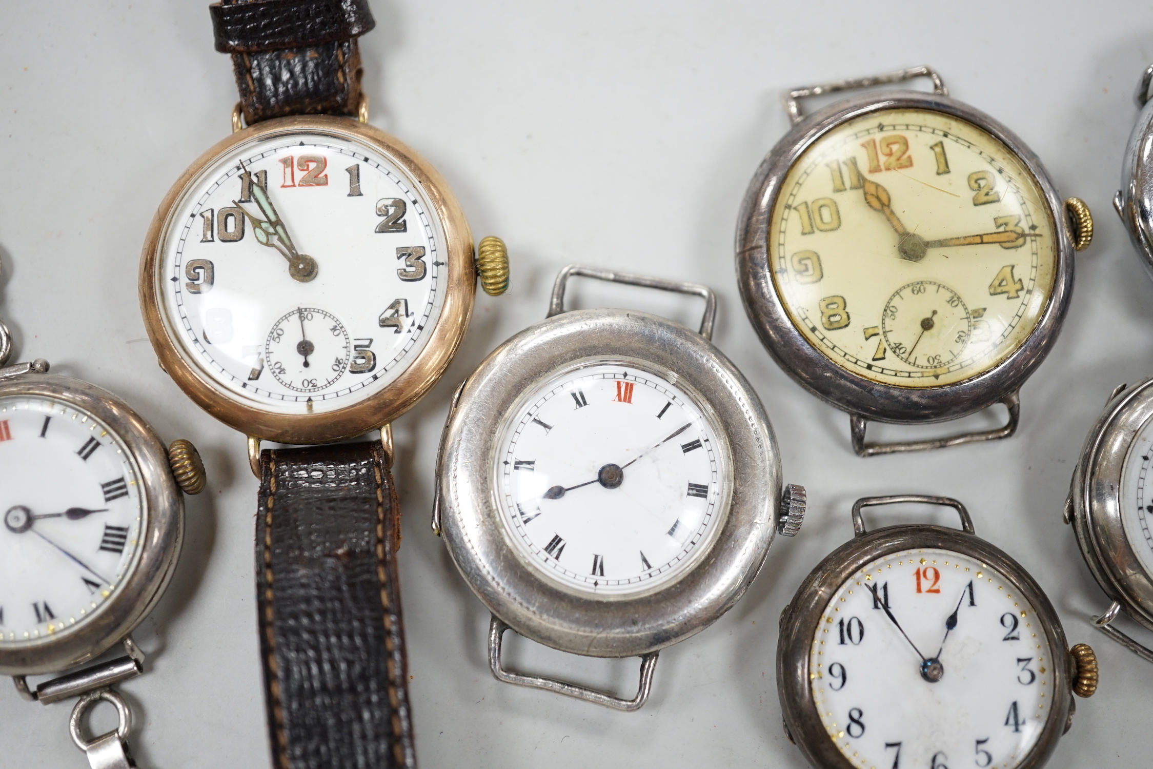 A gentleman's early 20th century 9ct gold manual wind wrist watch and six other wrist watches including silver.